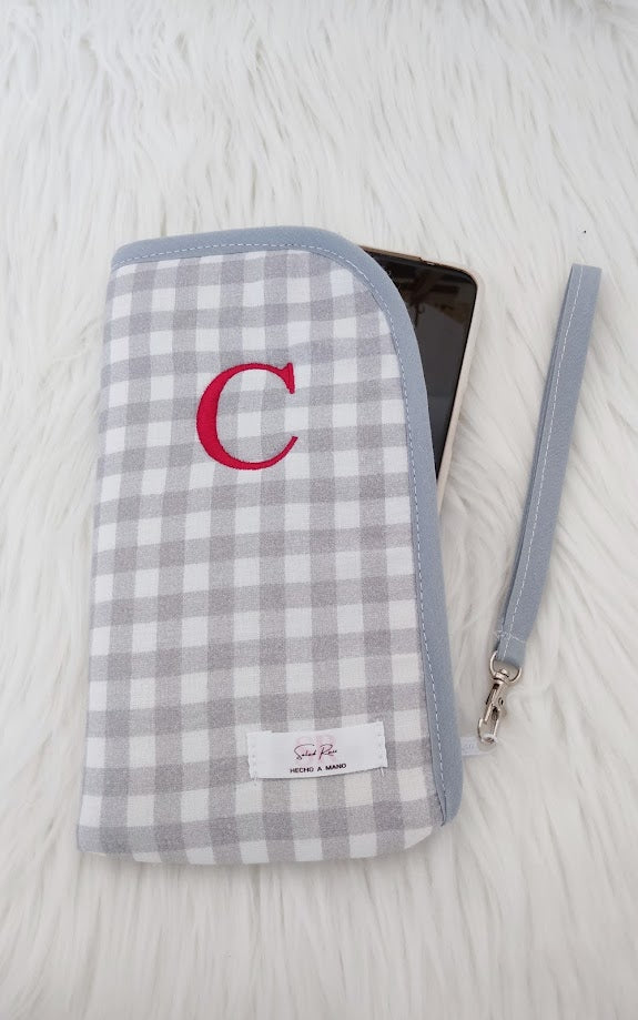 Funda de móvil acolchada con bolsillos interiores
